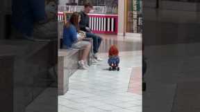 People FREAK OUT seeing chucky doll riding a tricycle