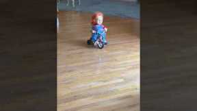 Chucky riding freely on a tricycle...NOPE!