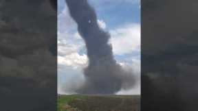 Massive tornado rips through field in Stettler, Canada