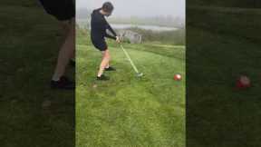 Woman accidentally lets go of golf club