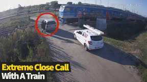 Motorist exits vehicle seconds before it is hit by train