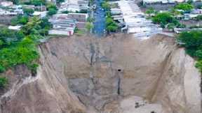 10 Sinkholes Caught Swallowing Things On An Epic Scale