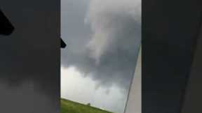 Mowing the lawn during a tornado
