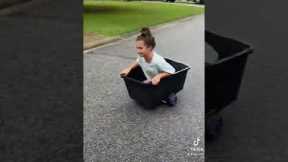 Two Girls make DIY go carts from Laundry Baskets to Race