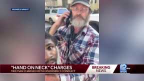 'Hand on neck' viral video leads to criminal charge
