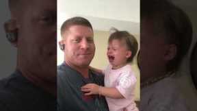Father tricks daughter into not crying