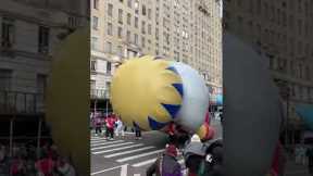 Inflatable nutcracker balloon knocks parade marcher to the ground