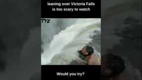 Viral video of woman leaning over Victoria Falls is too scary to watch! #shorts #viralshorts