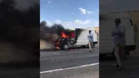 Man hilariously throws jug of water at huge car fire and achieves nothing
