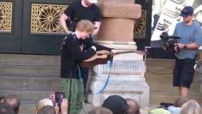 Ed Sheeran gives away his guitar to 10-year-old fan during impromptu concert