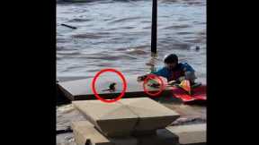 Kayaker saves two baby squirrels from flood waters