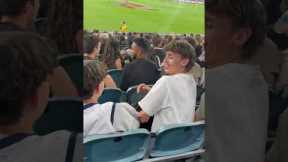 Australian woman has some fun at a football game