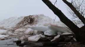 Massive mounds of ice sheets surface in Lake Superior