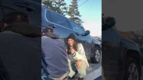 Guy regrets asking girlfriend help with changing tire