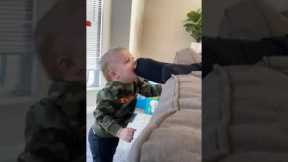 Little boy bites dad's toe 😂