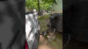 Tiny expert helps his dad align trailer hitch