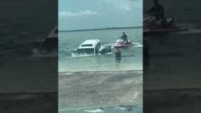 She tried to tow jet ski but her car got submerged! 😱