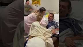 Father wakes from coma to meet newborn son