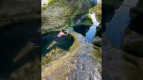 Guy swims through amazing natural pools