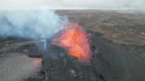 Spectacular footage of lava spurting from the newly-erupting volcano in Iceland