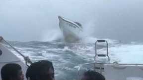 Passengers scream as speedboats bounce over huge waves