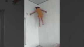 Spider-girl amazes with gravity-defying wall-climbing feat