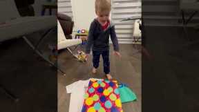 Kid has an adorable reaction on opening his birthday present