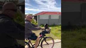 Mini Dachshund Cruises With Dad in a Bike Basket