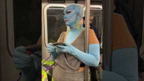 Subway commuter dresses as Handsome Squidward