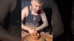 Master potter demonstrates artistry in creating pot and lid