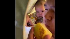 Baby has pure envy while watching dad eat a pear 😂