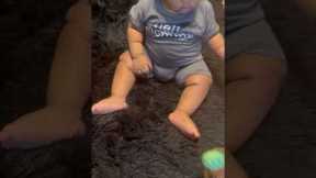 8-month-old baby screams at toy cactus