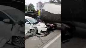 Massive cement pipe crushes parked cars