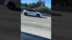 Cheater Car Cruises Down Interstate