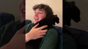 The greatest beatboxing duo? Man and cat beatbox together on couch