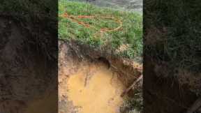 Clearing Blocked Culvert Drain With Tire - Satisfying!