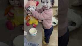 Toddler and Her Doll Get Covered in Cream