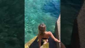 Woman Slips and Falls Into the Sea