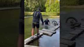 Bicyclist Falls Into Fish Pond
