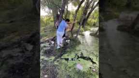 Stylish Man Dodges Muddy Mishap
