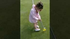 Young Girl Cheats At Golf