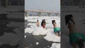 Locals Bathe In Polluted Foam River