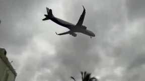 Plane Aborts Landing During Cyclone In Crazy Footage
