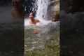 Woman Underestimates Waterfall's Power