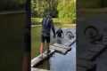Bicyclist Falls Into Fish Pond